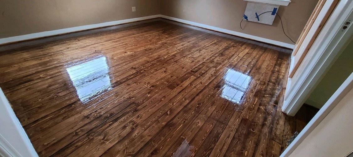 An image showing how well we resurface hardwood floors in the Arlington Estates area.