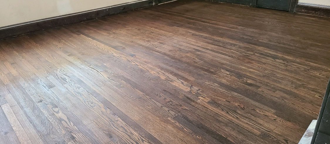 A refinished hardwood floor in the Columbia area