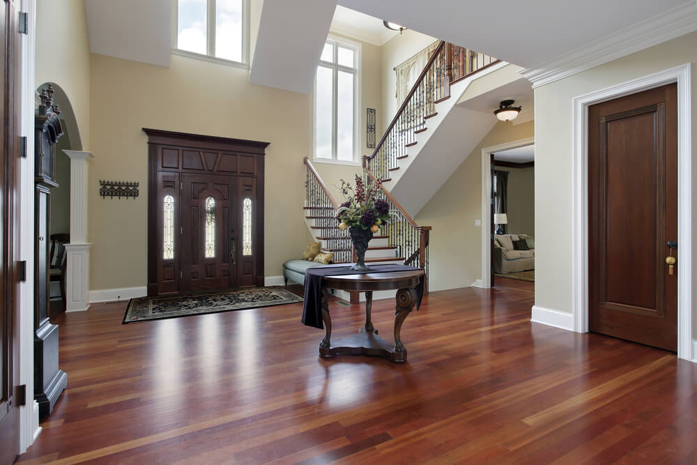 an entry way with resurfaced hardwood floors